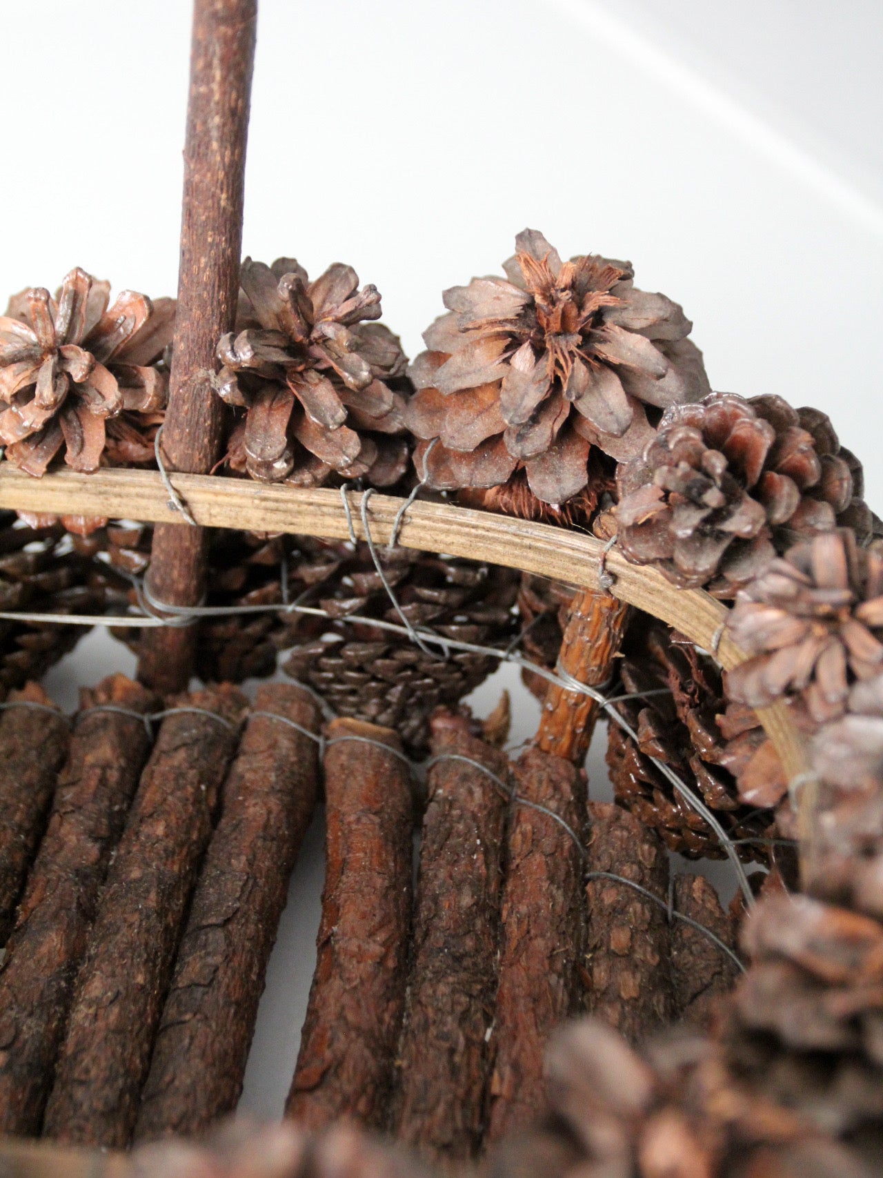 vintage handmade pinecone basket