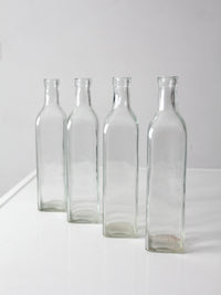 vintage wicker bottle basket with glass bottles