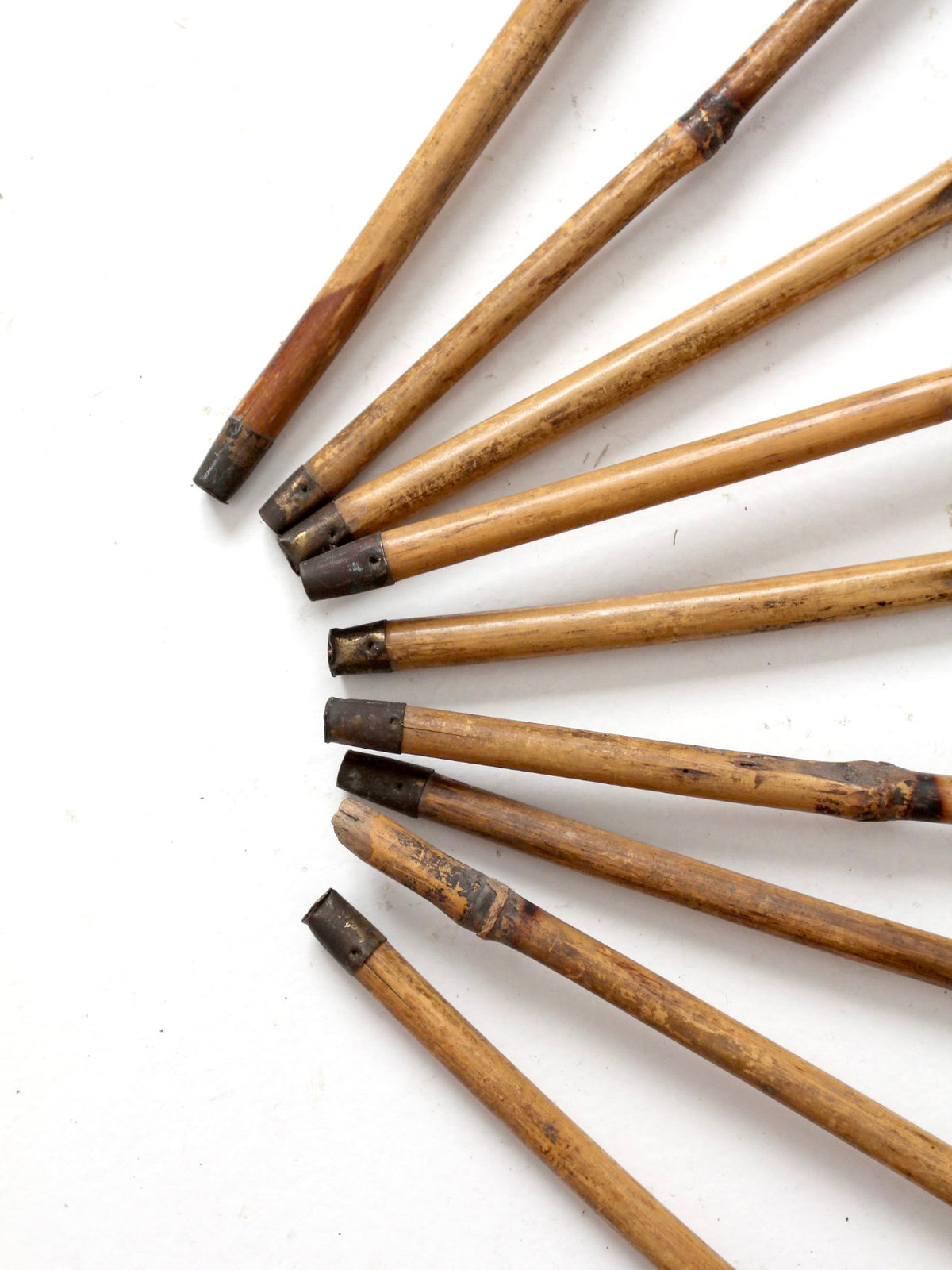 collection of antique bamboo walking canes