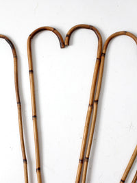 collection of antique bamboo walking canes