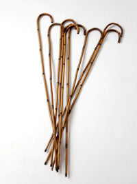 collection of antique bamboo walking canes