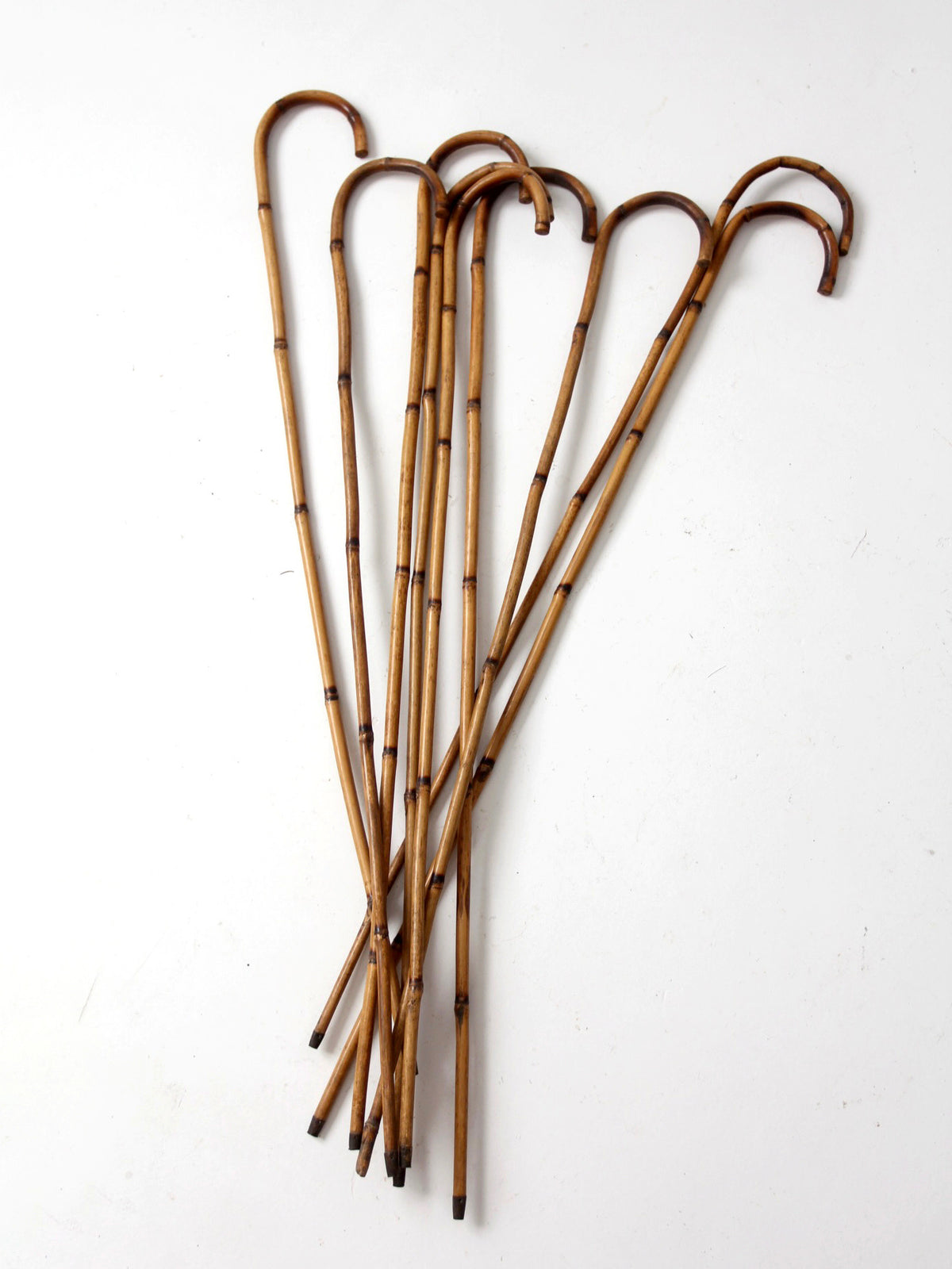 collection of antique bamboo walking canes