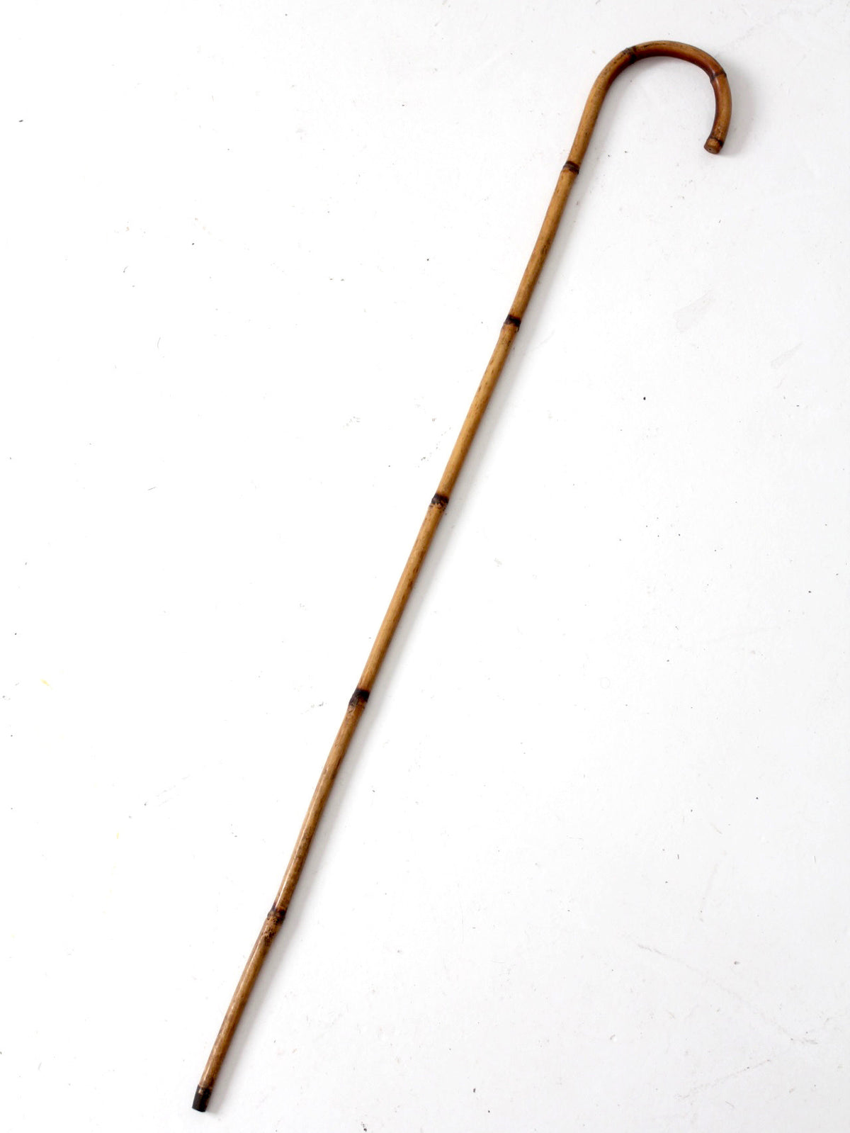 collection of antique bamboo walking canes