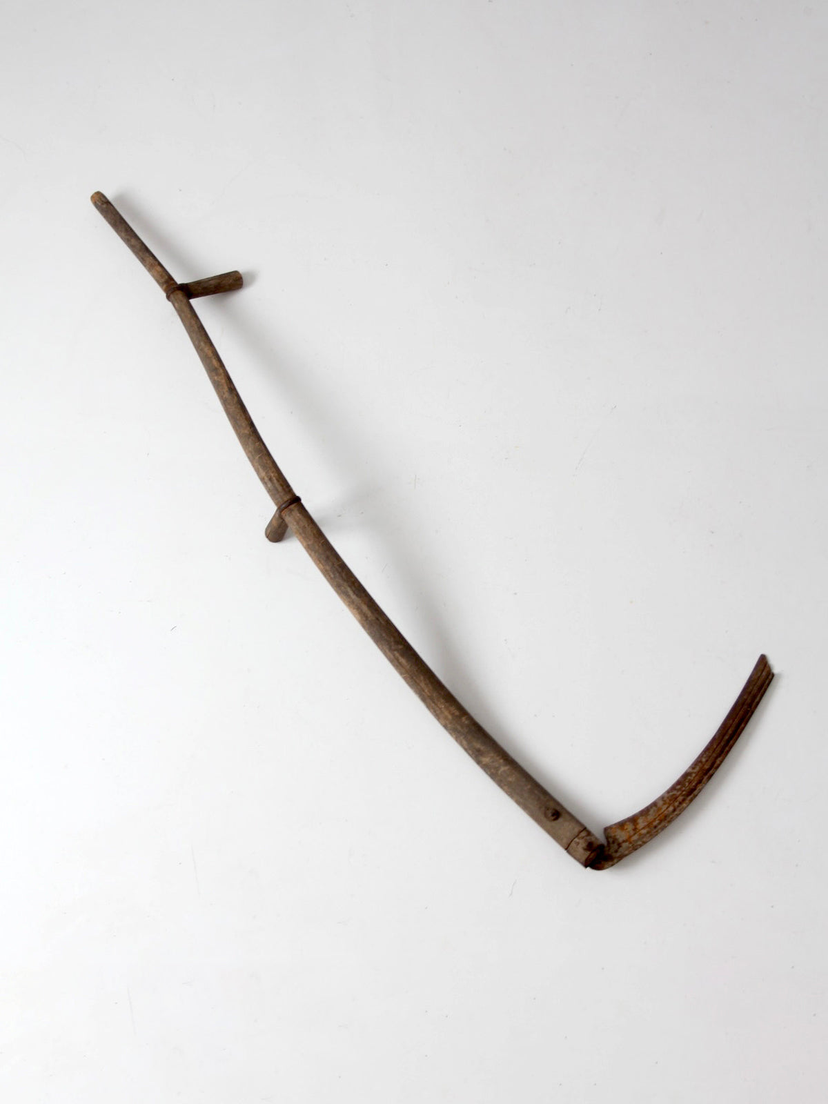 antique wood and iron farm scythe