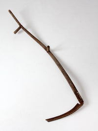 antique wood and iron farm scythe