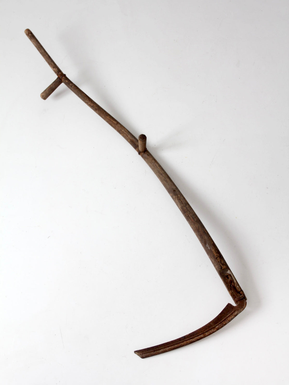 antique wood and iron farm scythe