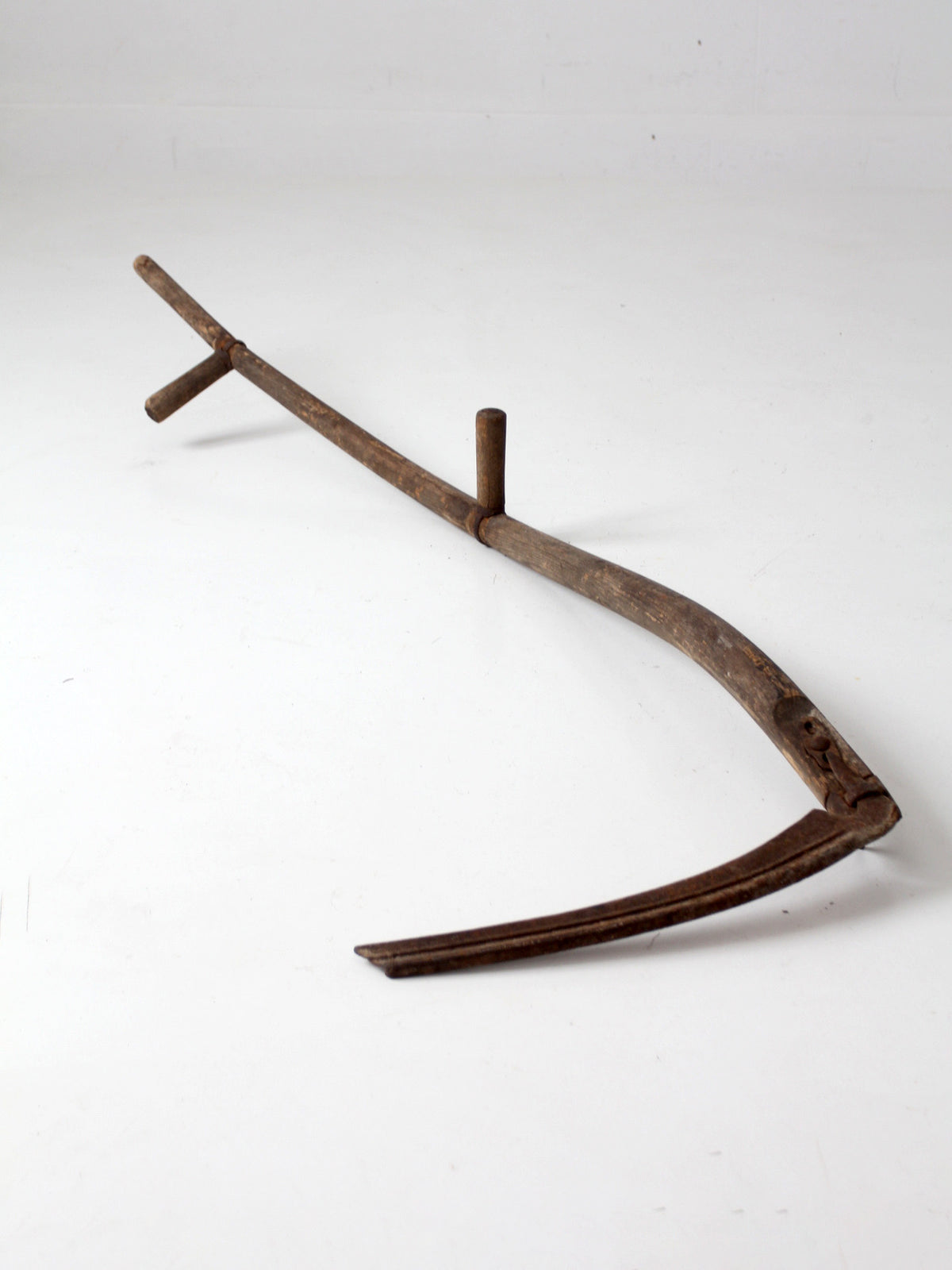 antique wood and iron farm scythe