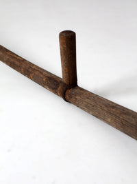 antique wood and iron farm scythe