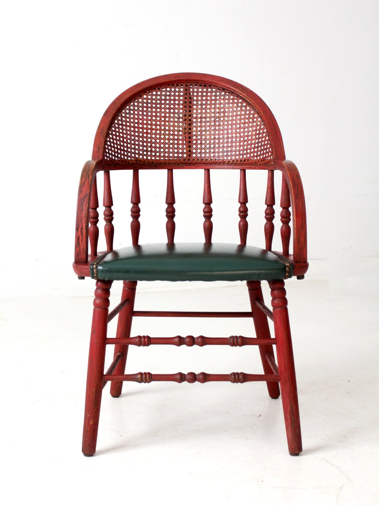 antique red Windsor cane back arm chair with upholstered seat