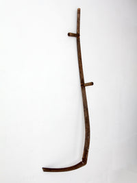 antique wood and iron farm scythe