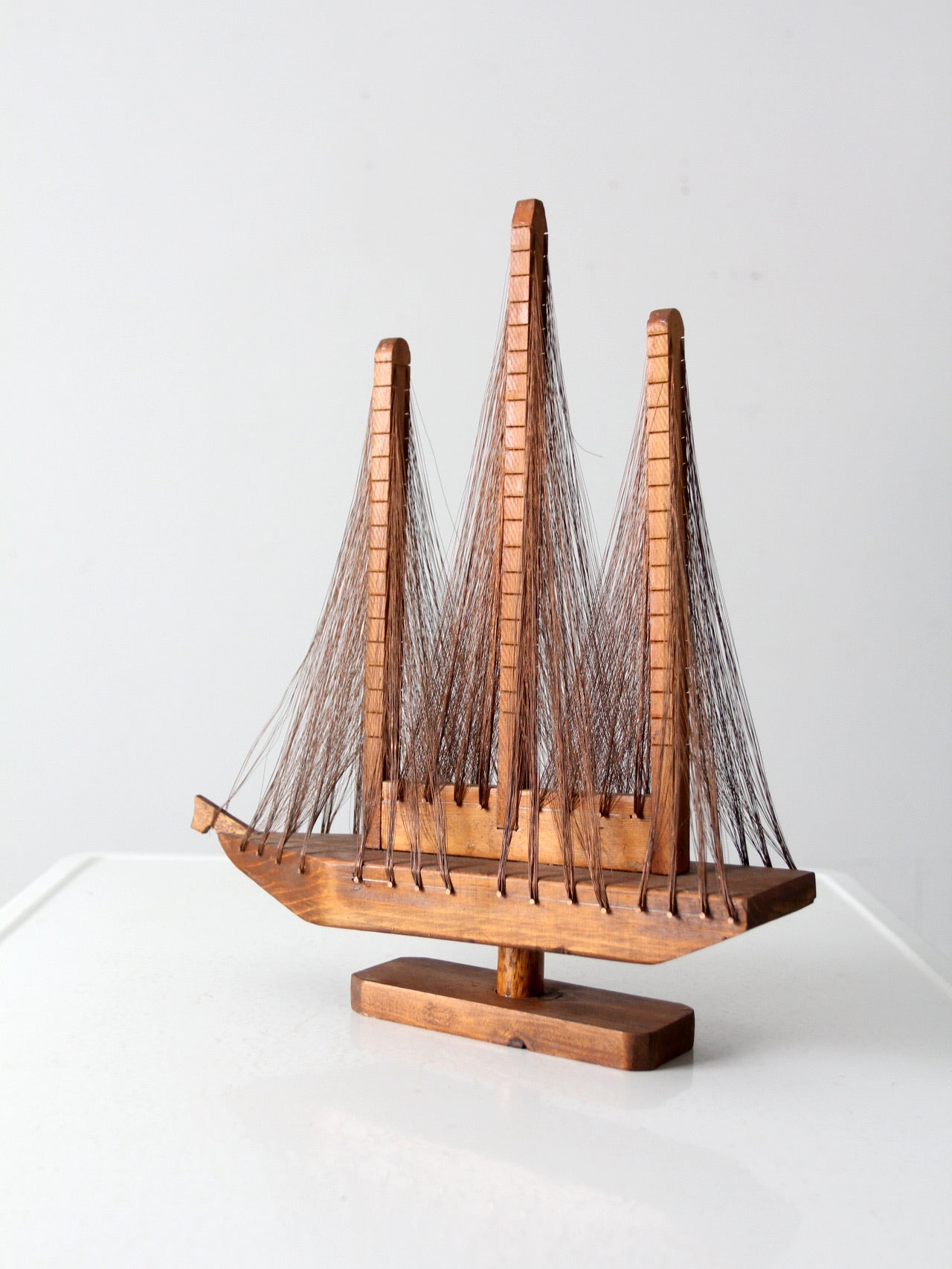 vintage string art sailboat sculpture
