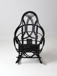 antique black Adirondack rocking chair