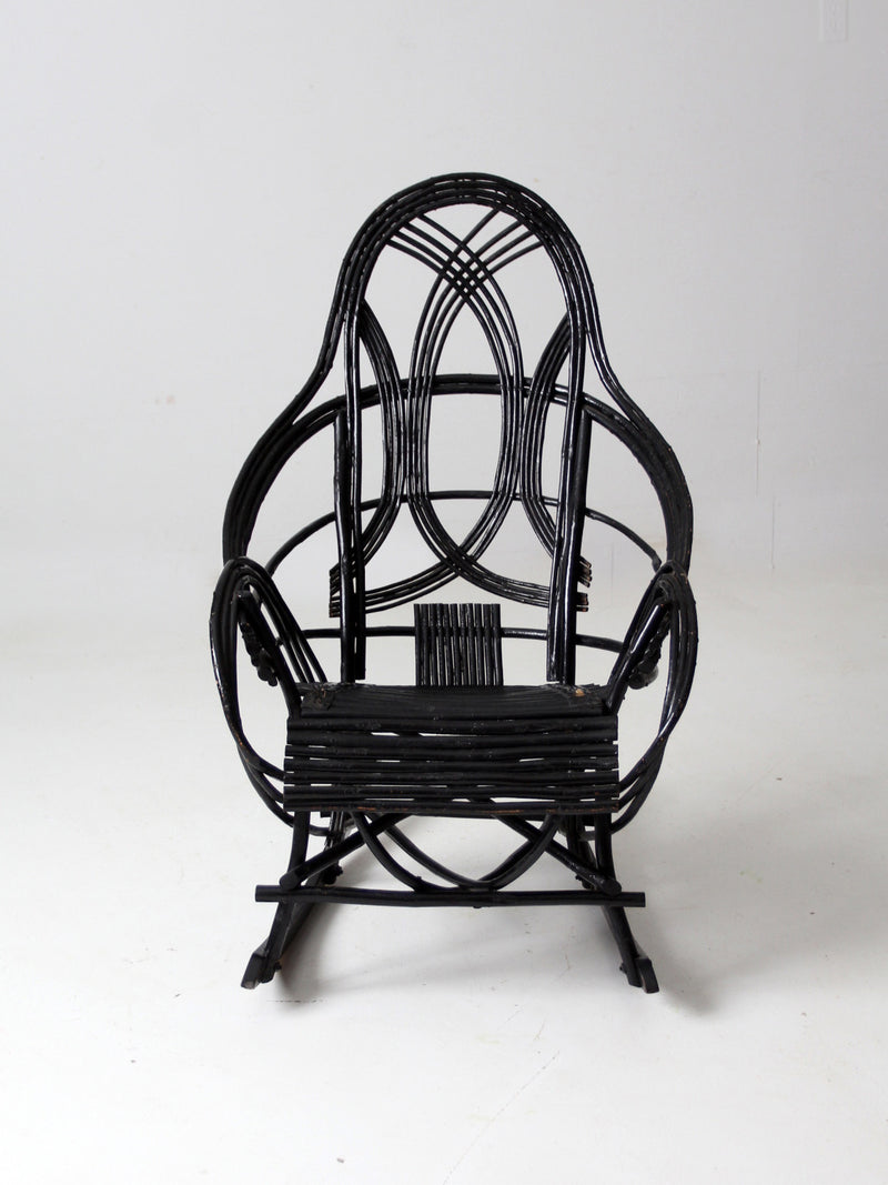 antique black Adirondack rocking chair