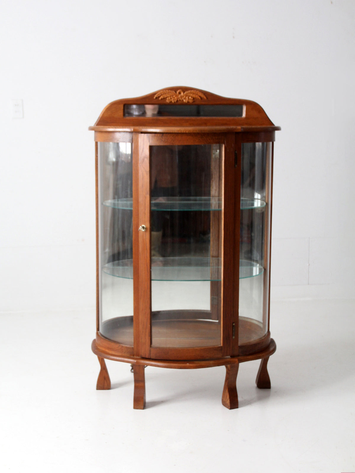 vintage curved glass curio cabinet