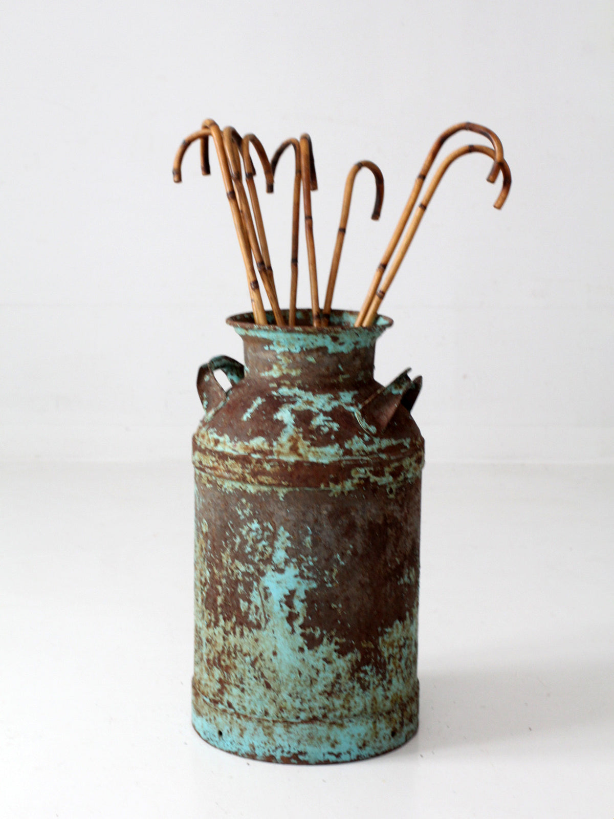 antique turquoise painted metal milk can