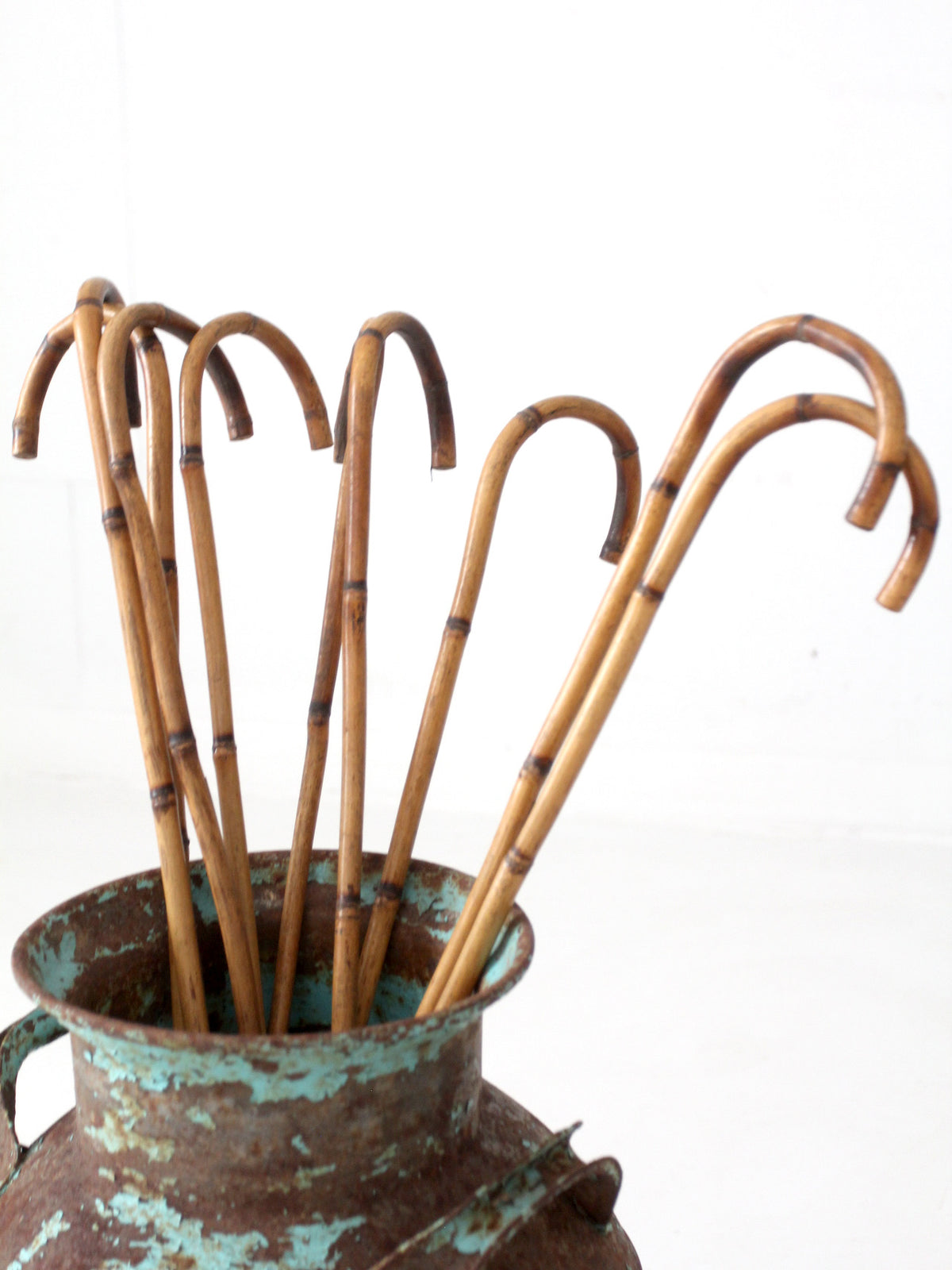 collection of antique bamboo walking canes