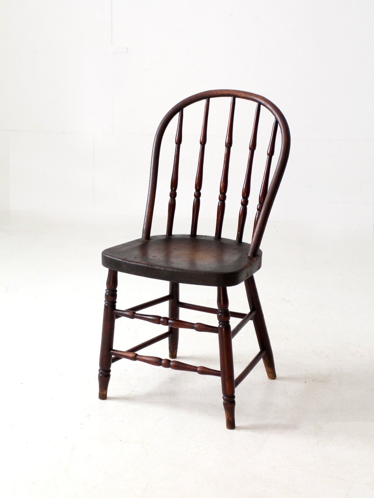 antique Windsor chair with turned spindles