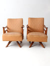 mid century modern swivel lounge chairs pair