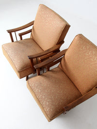 mid century modern swivel lounge chairs pair
