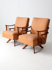 mid century modern swivel lounge chairs pair