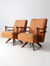 mid century modern swivel lounge chairs pair