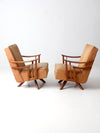 mid century modern swivel lounge chairs pair