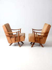 mid century modern swivel lounge chairs pair