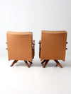 mid century modern swivel lounge chairs pair