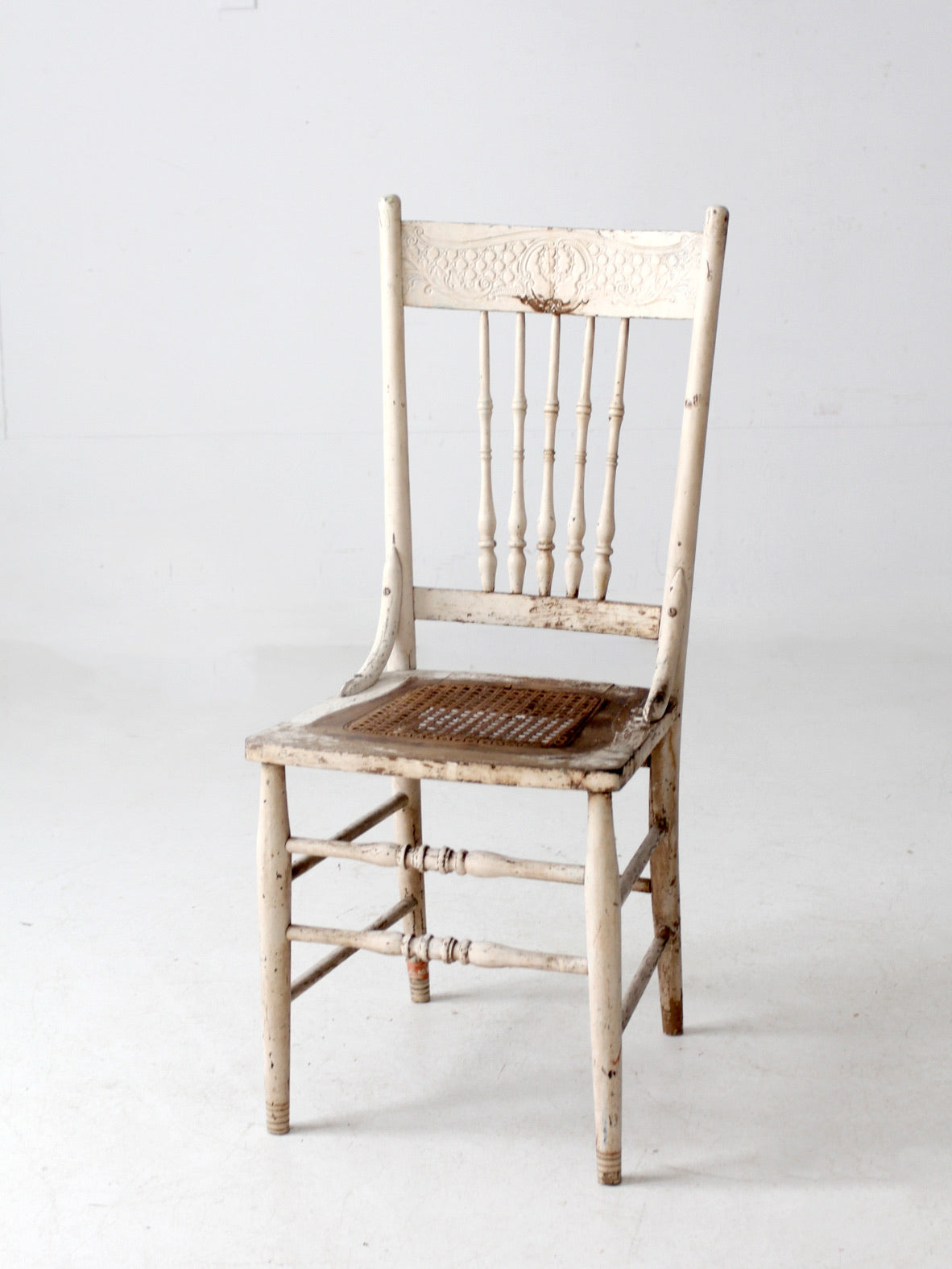 antique painted press back chair with cane seat
