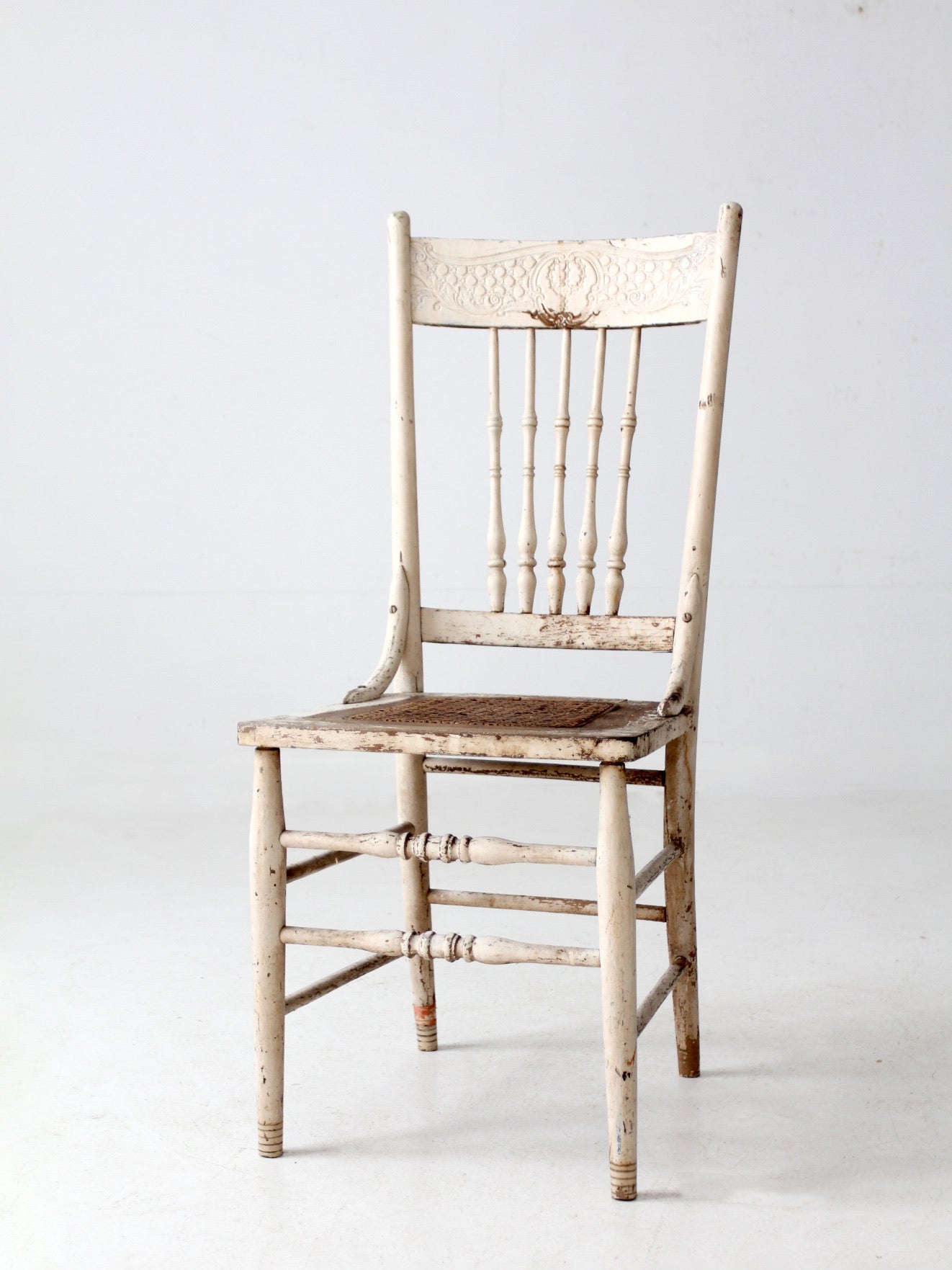 antique painted press back chair with cane seat