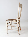 antique painted press back chair with cane seat