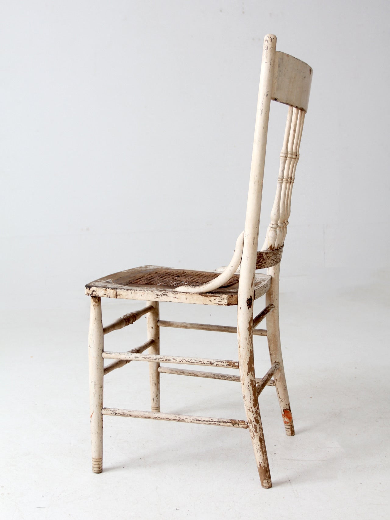 antique painted press back chair with cane seat