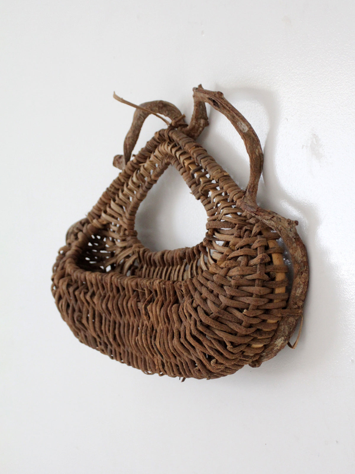 vintage woven vine wall basket