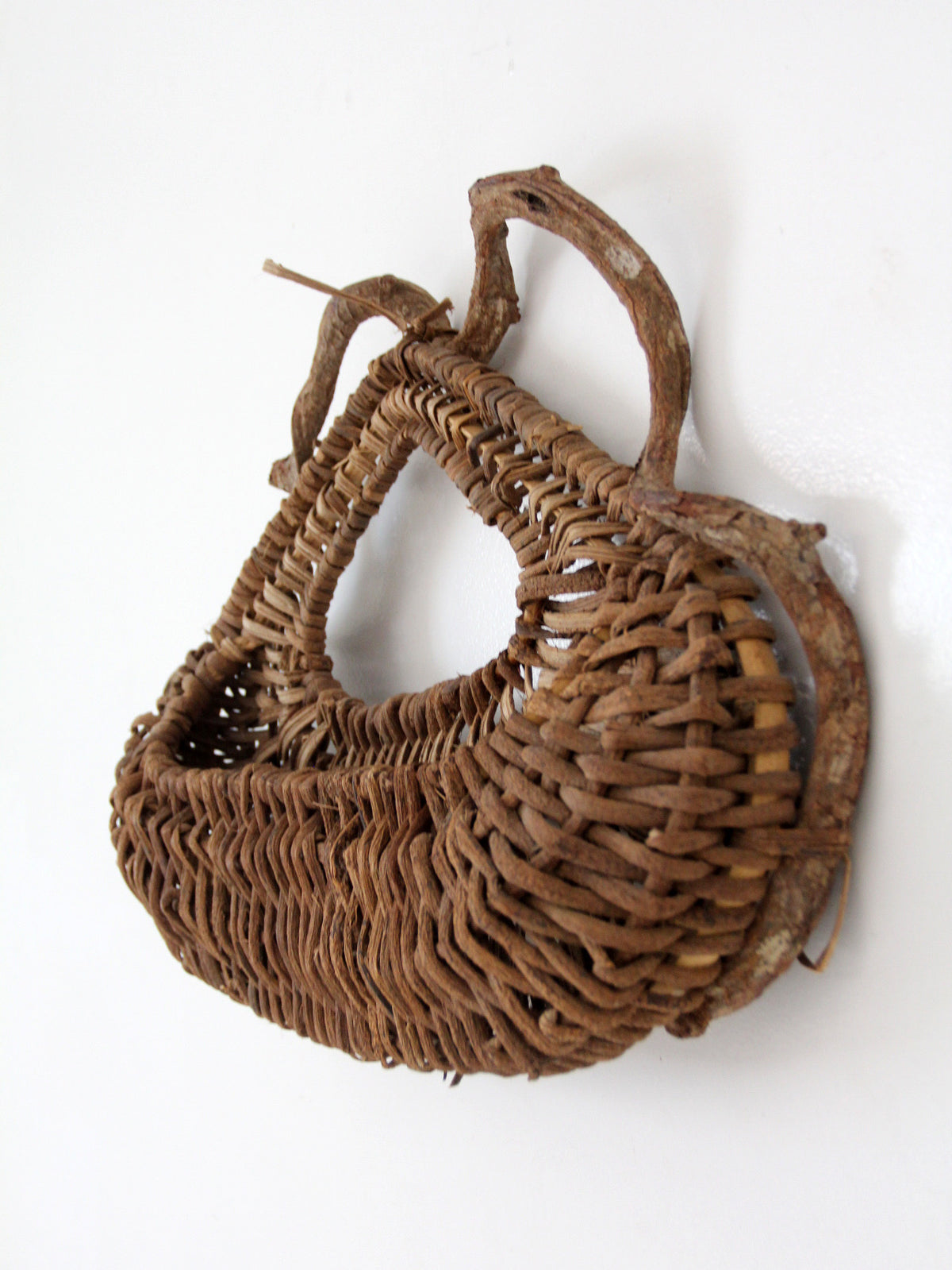 vintage woven vine wall basket