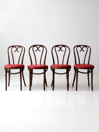 mid-century ZPM Radomsko bentwood dining chairs with red seats | set of four