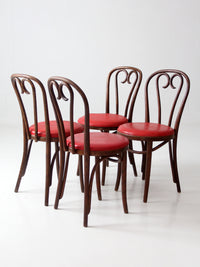 mid-century ZPM Radomsko bentwood dining chairs with red seats | set of four