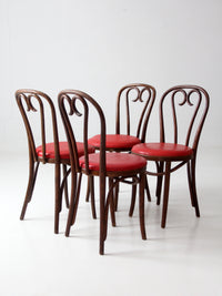 mid-century ZPM Radomsko bentwood dining chairs with red seats | set of four