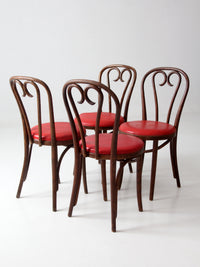 mid-century ZPM Radomsko bentwood dining chairs with red seats | set of four