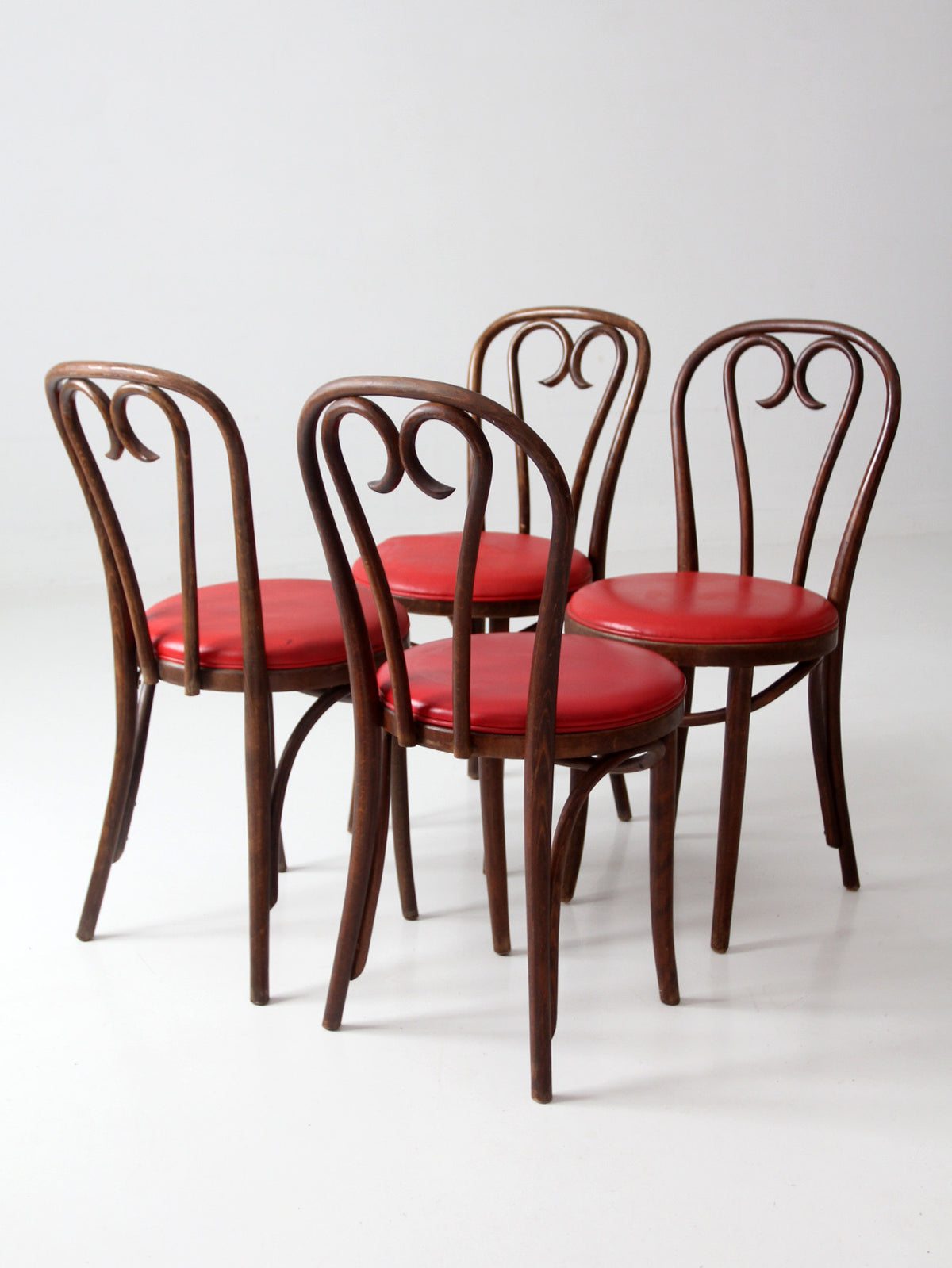 mid-century ZPM Radomsko bentwood dining chairs with red seats | set of four