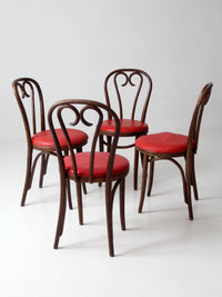 mid-century ZPM Radomsko bentwood dining chairs with red seats | set of four