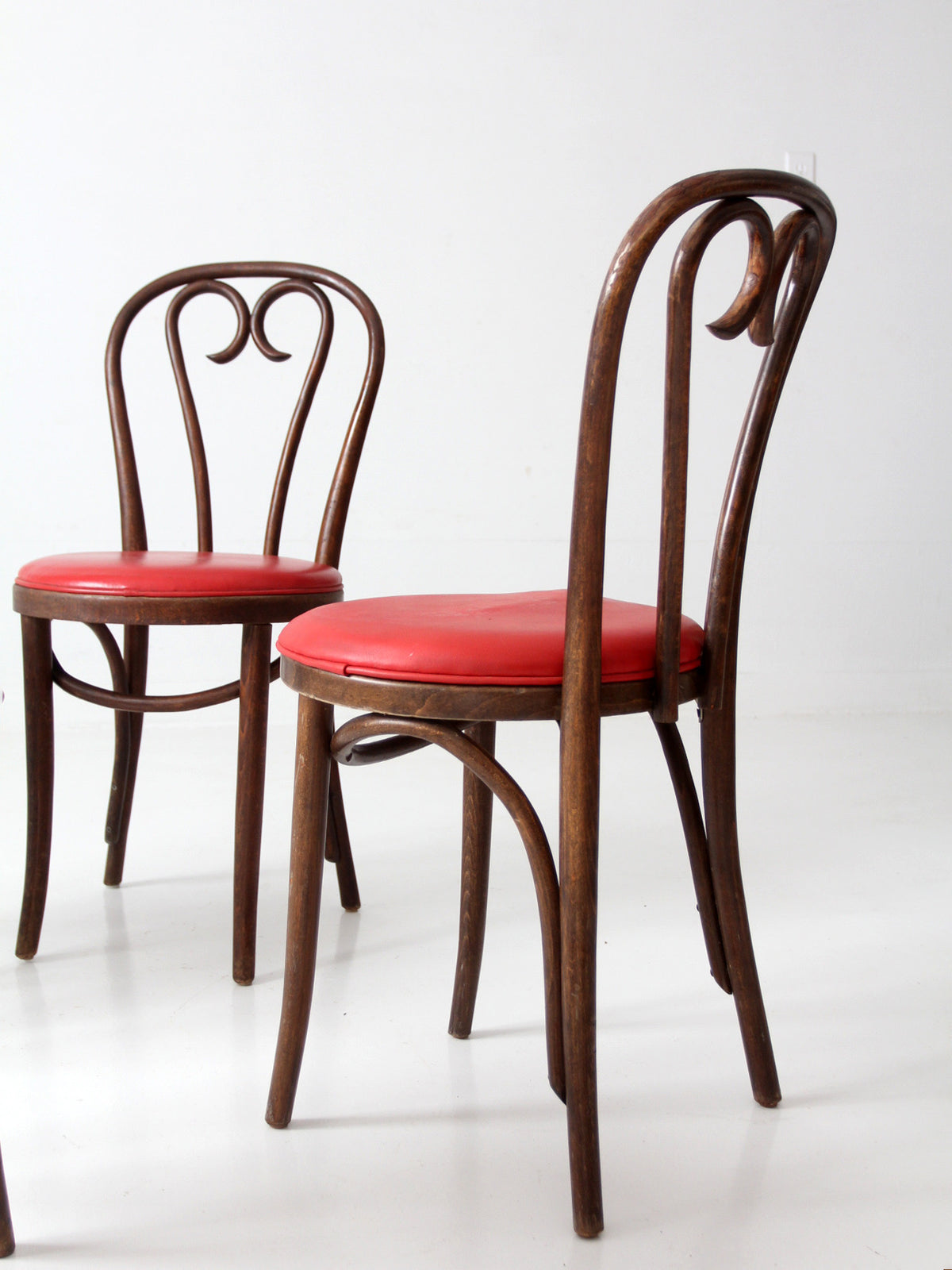 mid-century ZPM Radomsko bentwood dining chairs with red seats | set of four