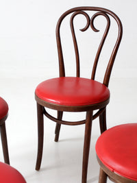 mid-century ZPM Radomsko bentwood dining chairs with red seats | set of four