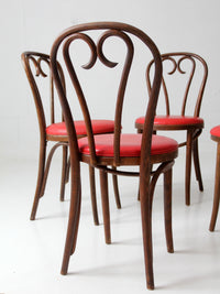 mid-century ZPM Radomsko bentwood dining chairs with red seats | set of four