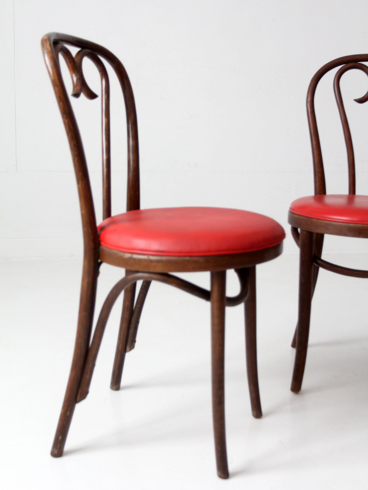 mid-century ZPM Radomsko bentwood dining chairs with red seats | set of four
