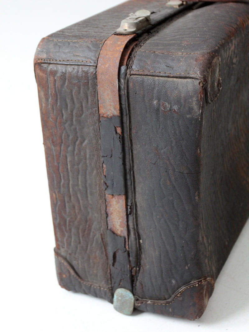 vintage distressed leather luggage