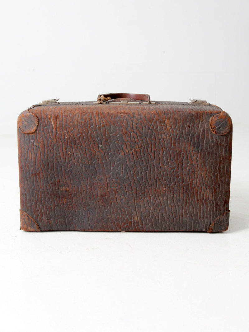 vintage distressed leather luggage
