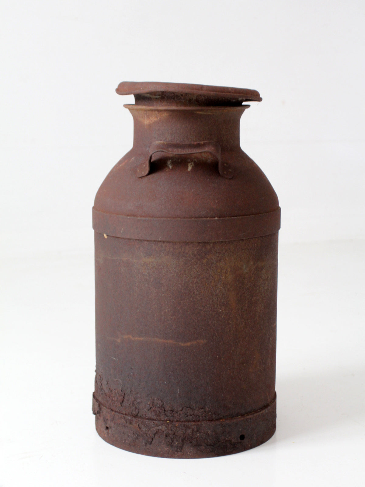 antique steel dairy milk can with lid