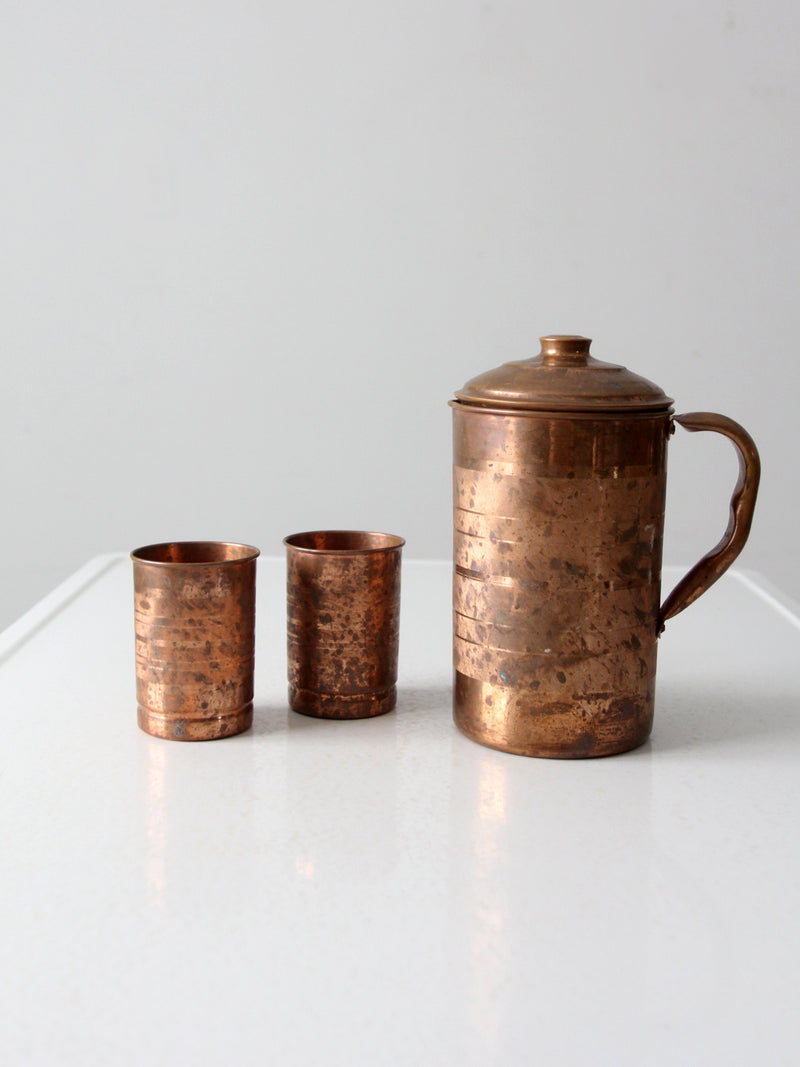 vintage copper pitcher and cups set