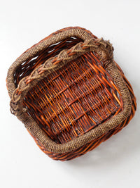 vintage woven willow basket with wrapped arched handle