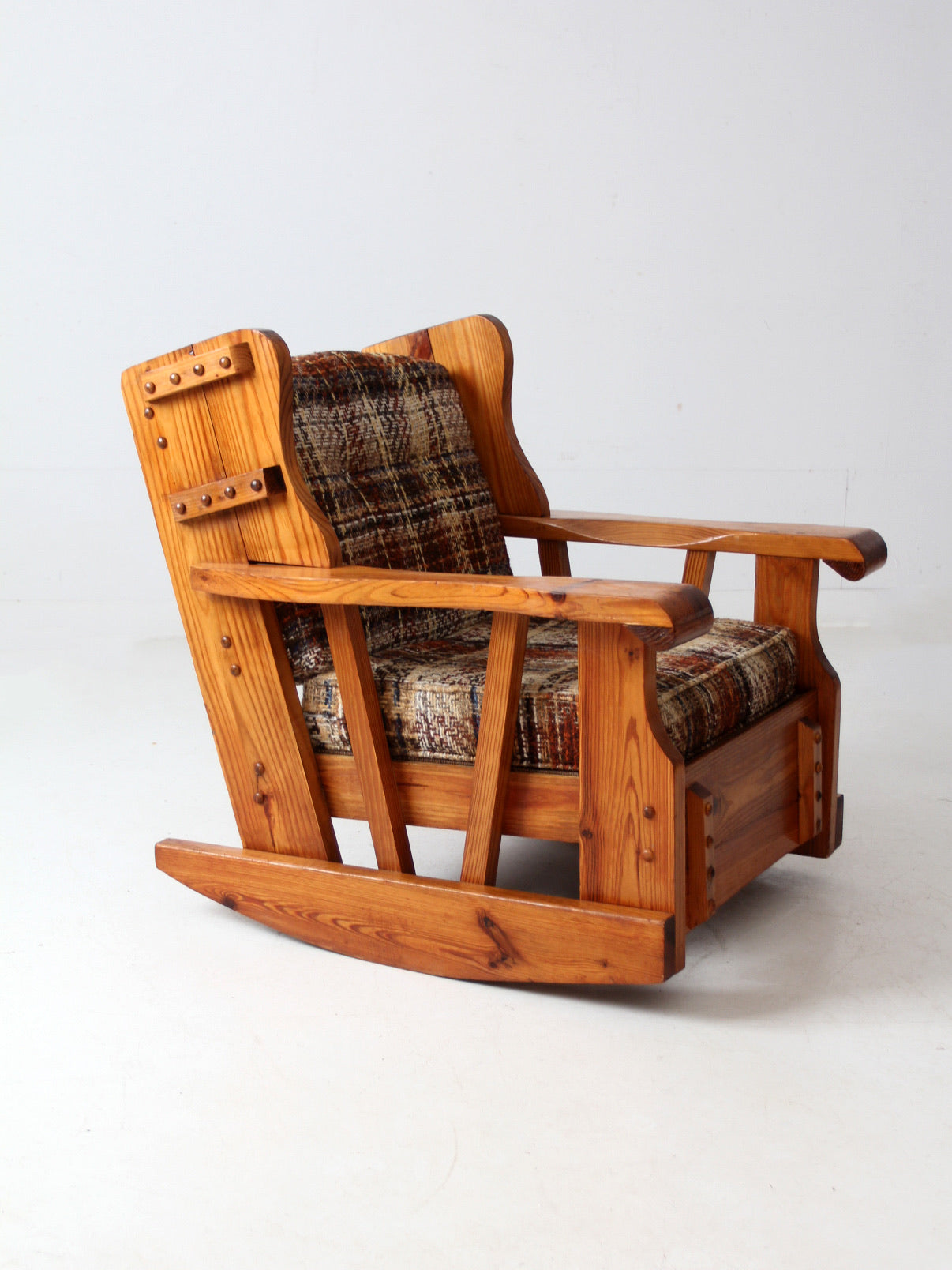 vintage pine rocking chair with plaid tweed cushions